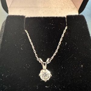 14 Kt Gold Necklace with Diamond Solitaire Pendant. .25 ct